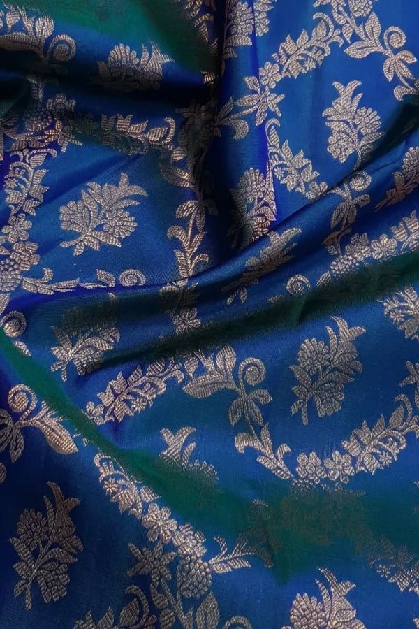 Navy Blue Banarasi Soft Silk Saree with Gold Zari Floral Jaal and Teal Contrast Edge  in Surat