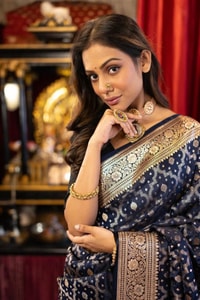 Navy Blue Banarasi Soft Silk Saree with Silver Zari Buttis and Large Paisley Motif Pallu  in Surat