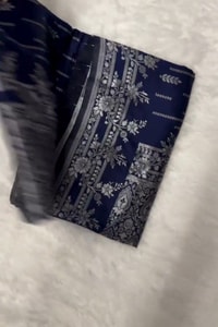 Navy Blue Banarasi Soft Silk Saree with Silver Zari Figurative Weave and Shimmering Pallu  in Surat video 1