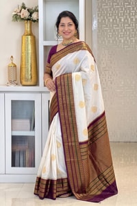 Off-White Banarasi Soft Silk Saree with Gold Buttas and Contrast Magenta Striped Border  in Surat