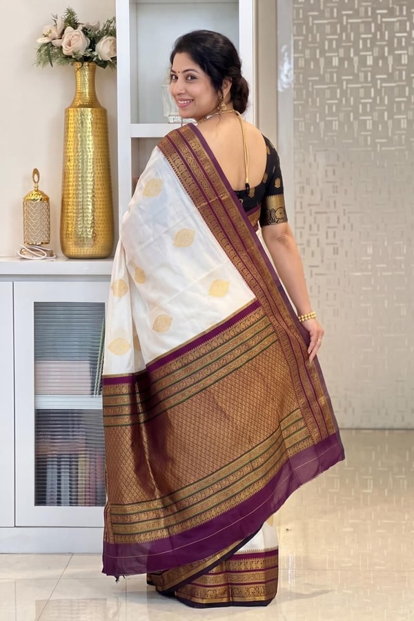 Off-White Banarasi Soft Silk Saree with Gold Buttas and Contrast Magenta Striped Border  in Surat