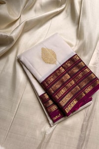 Off-White Banarasi Soft Silk Saree with Gold Buttas and Contrast Magenta Striped Border  in Surat