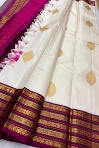 Off-White Banarasi Soft Silk Saree with Gold Buttas and Contrast Magenta Striped Border  in Surat