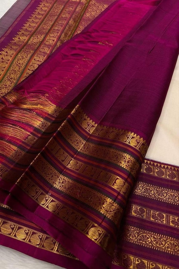 Off-White Banarasi Soft Silk Saree with Gold Buttas and Contrast Magenta Striped Border  in Surat