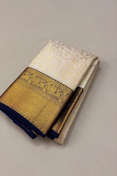 Off-White Banarasi Soft Silk Saree with Heavy Gold Zari Border and Navy Blue Edging in Surat