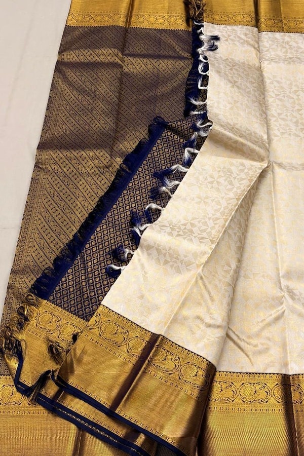 Off-White Banarasi Soft Silk Saree with Heavy Gold Zari Border and Navy Blue Edging  in Surat