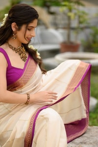 Off-White Kerala Style Banarasi Soft Silk Saree with Magenta Zari Border and Pinstripe Body  in Surat