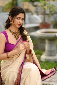 Off-White Kerala Style Banarasi Soft Silk Saree with Magenta Zari Border and Pinstripe Body  in Surat