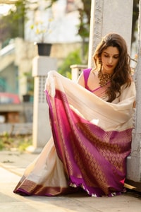 Off-White Kerala Style Banarasi Soft Silk Saree with Magenta Zari Border and Pinstripe Body  in Surat