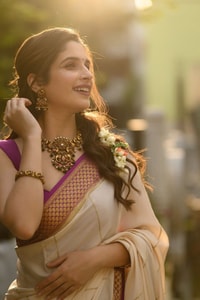 Off-White Kerala Style Banarasi Soft Silk Saree with Magenta Zari Border and Pinstripe Body  in Surat