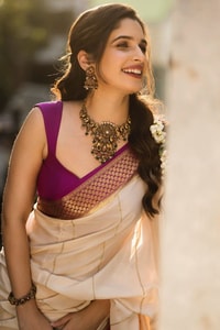Off-White Kerala Style Banarasi Soft Silk Saree with Magenta Zari Border and Pinstripe Body  in Surat