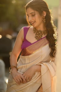 Off-White Kerala Style Banarasi Soft Silk Saree with Magenta Zari Border and Pinstripe Body  in Surat