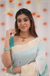 Off-White Saree with Silver Zari Contrast Border and Pallu in Green, Teal, Pink and Sky Blue  in Surat