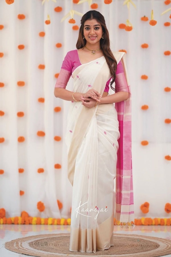 Off-White Saree with Silver Zari Contrast Border and Pallu in Green, Teal, Pink and Sky Blue  in Surat
