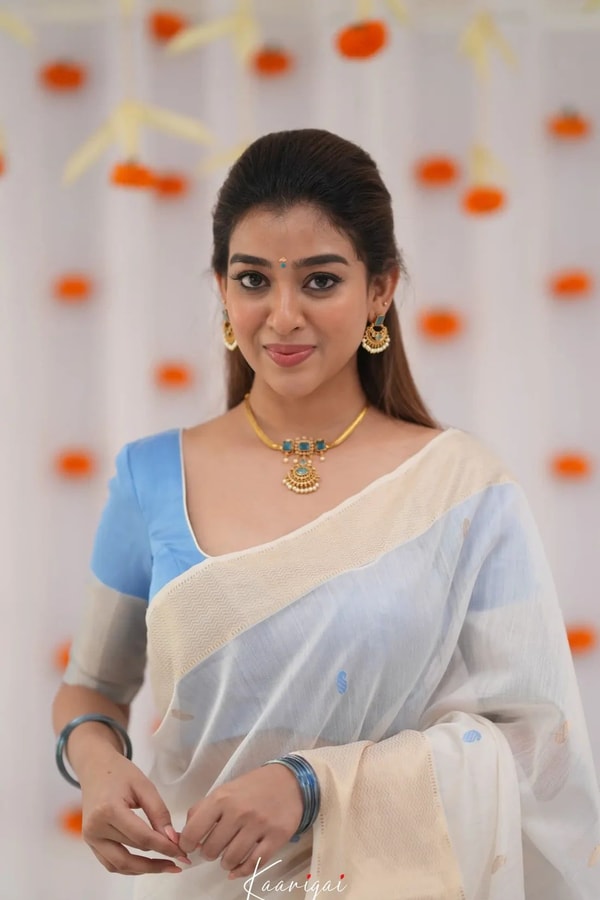 Off-White Saree with Silver Zari Contrast Border and Pallu in Green, Teal, Pink and Sky Blue  in Surat