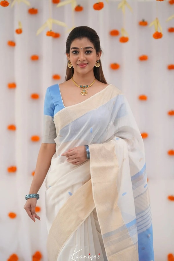 Off-White Saree with Silver Zari Contrast Border and Pallu in Green, Teal, Pink and Sky Blue  in Surat