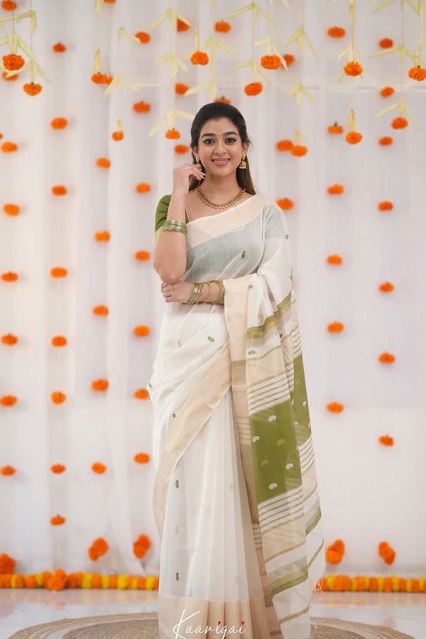 Off-White Saree with Silver Zari Contrast Border and Pallu in Green, Teal, Pink and Sky Blue  in Surat