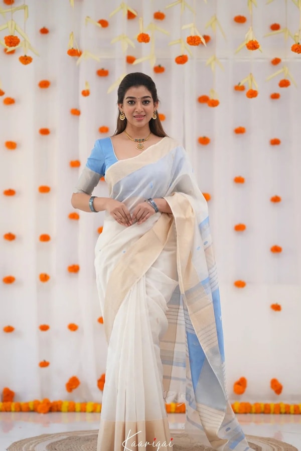 Off-White Saree with Silver Zari Contrast Border and Pallu in Green, Teal, Pink and Sky Blue  in Surat