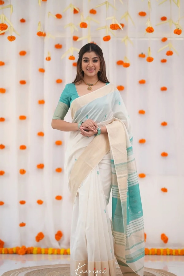 Off-White Saree with Silver Zari Contrast Border and Pallu in Green, Teal, Pink and Sky Blue  in Surat