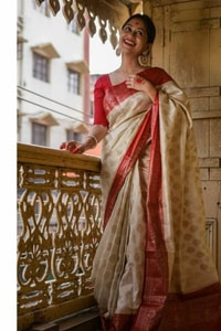 Off-White Soft Lichi Silk Saree with Red Jacquard Border and Gold Zari Butis  in Surat