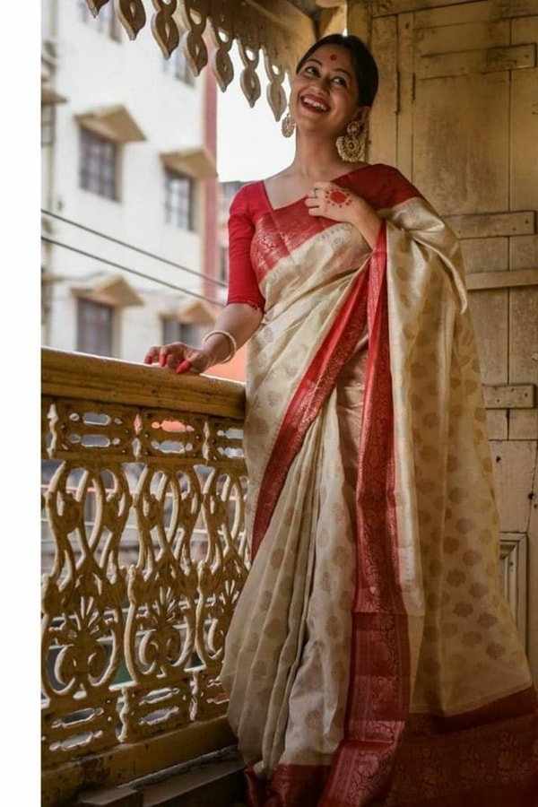Off-White Soft Lichi Silk Saree with Red Jacquard Border and Gold Zari Butis  in Surat