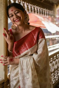 Off-White Soft Lichi Silk Saree with Red Jacquard Border and Gold Zari Butis  in Surat