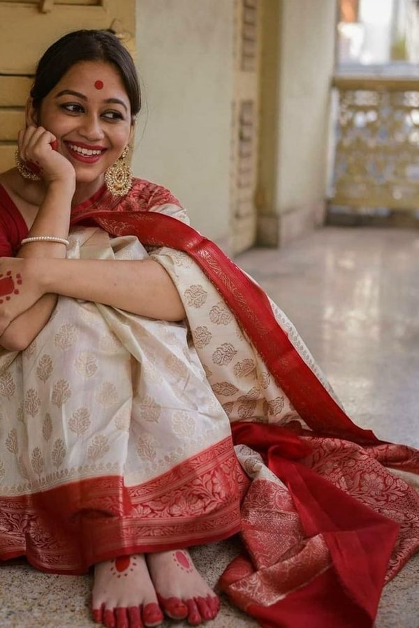 Off-White Soft Lichi Silk Saree with Red Jacquard Border and Gold Zari Butis  in Surat