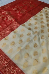 Off-White Soft Lichi Silk Saree with Red Jacquard Border and Gold Zari Butis  in Surat