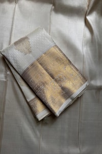 Off-White and Wine Banarasi Soft Silk Saree with Gold Zari Buttas and Wide Gold Border  in Surat