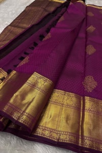 Off-White and Wine Banarasi Soft Silk Saree with Gold Zari Buttas and Wide Gold Border  in Surat