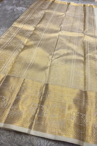 Off-White and Wine Banarasi Soft Silk Saree with Gold Zari Buttas and Wide Gold Border  in Surat