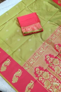 Parrot Green Soft Lichi Silk Saree with Rani Pink Border and Gold Zari Peacock Motifs  in Surat