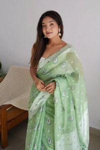 Pastel Soft Cotton Saree with Full Body Floral Weaving and White Jacquard Border  in Surat