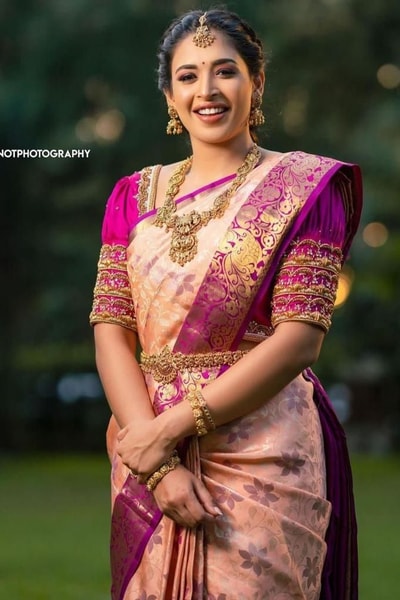 Peach Pink Banarasi Soft Silk Saree with Magenta Brocade Border and Zari Paisley Pallu in Surat