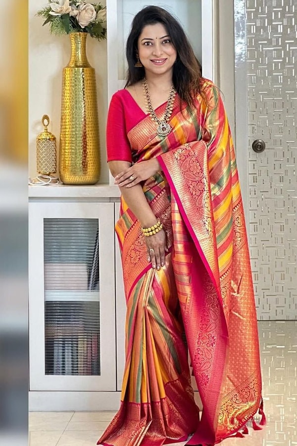 Peach and Pink Zari Woven Saree with Diagonal Multi-Colour Stripes and Rich Pallu  in Surat