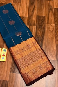 Peacock Blue Banarasi Soft Silk Saree with Copper Zari Buttis and Heavy Copper Pallu  in Surat