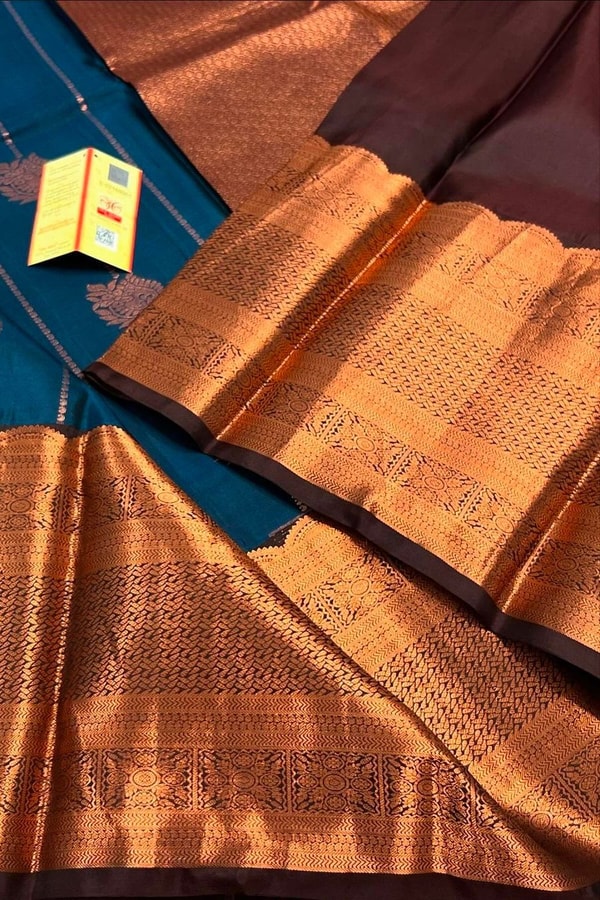Peacock Blue Banarasi Soft Silk Saree with Copper Zari Buttis and Heavy Copper Pallu  in Surat