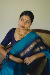 Peacock Blue Banarasi Soft Silk Saree with Navy Temple Border and Gold Zari Woven Pallu  in Surat