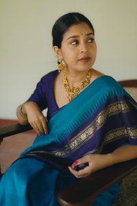 Peacock Blue Banarasi Soft Silk Saree with Navy Temple Border and Gold Zari Woven Pallu  in Surat