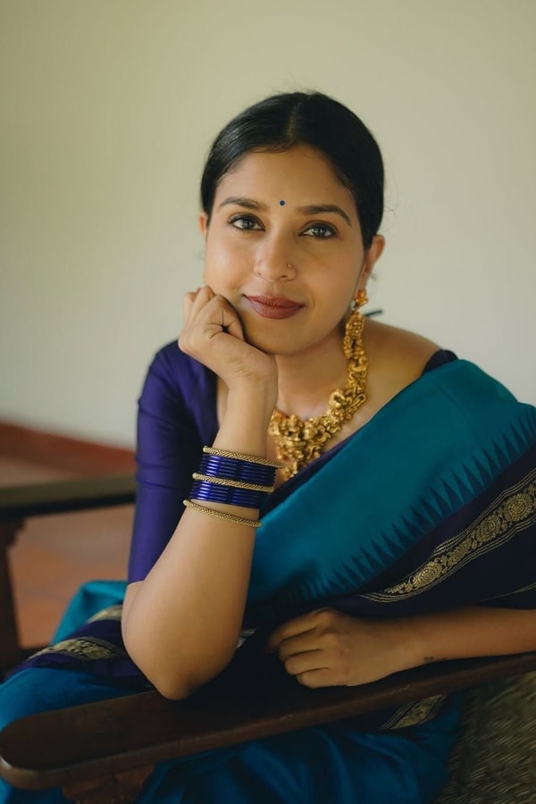 Peacock Blue Banarasi Soft Silk Saree with Navy Temple Border and Gold Zari Woven Pallu  in Surat