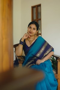 Peacock Blue Banarasi Soft Silk Saree with Navy Temple Border and Gold Zari Woven Pallu  in Surat
