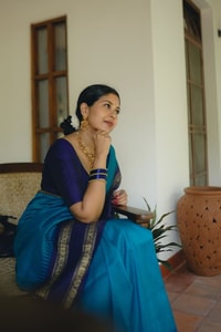Peacock Blue Banarasi Soft Silk Saree with Navy Temple Border and Gold Zari Woven Pallu  in Surat