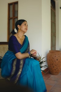 Peacock Blue Banarasi Soft Silk Saree with Navy Temple Border and Gold Zari Woven Pallu  in Surat