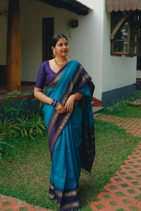Peacock Blue Banarasi Soft Silk Saree with Navy Temple Border and Gold Zari Woven Pallu  in Surat