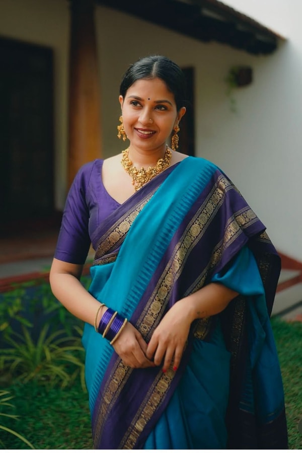 Peacock Blue Banarasi Soft Silk Saree with Navy Temple Border and Gold Zari Woven Pallu  in Surat