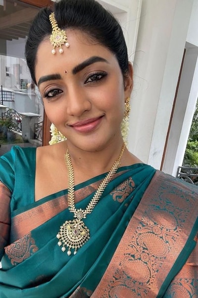 Peacock Teal Banarasi Soft Silk Saree with Contrast Copper Zari Border and Pallu in Surat