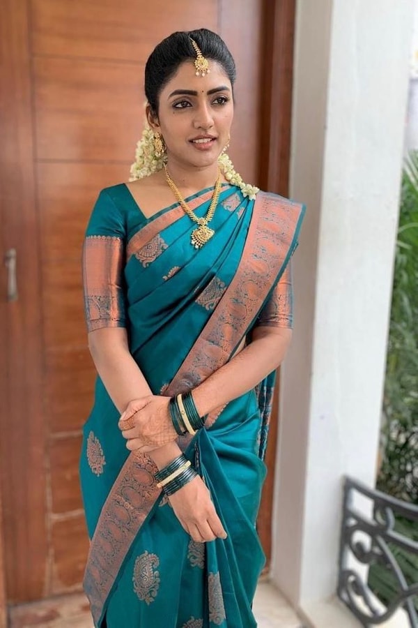 Peacock Teal Banarasi Soft Silk Saree with Contrast Copper Zari Border and Pallu  in Surat