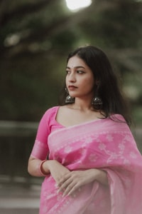 Pink Saree with Tonal Woven Floral Jaal and Soft Textured Finish for Day Functions  in Surat