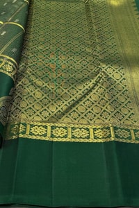 Pinstripe Checks Banarasi Soft Silk Saree with Paisley Zari Border in Purple and Bottle Green  in Surat