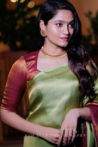 Pista Green Banarasi Soft Silk Saree with Maroon Border and Copper Zari Woven Body  in Surat